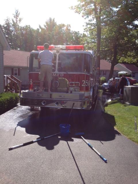 Cleaning Engine 258 in Lake George For Hudson Valley Parade in June, 2012